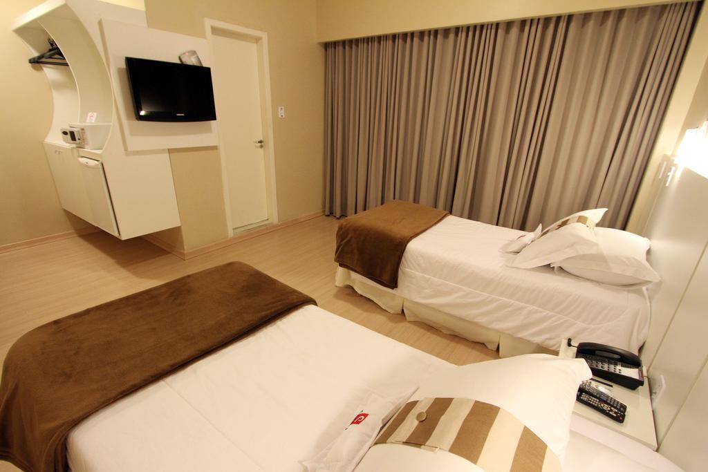 Hotel Curi Executive Pelotas Oda fotoğraf