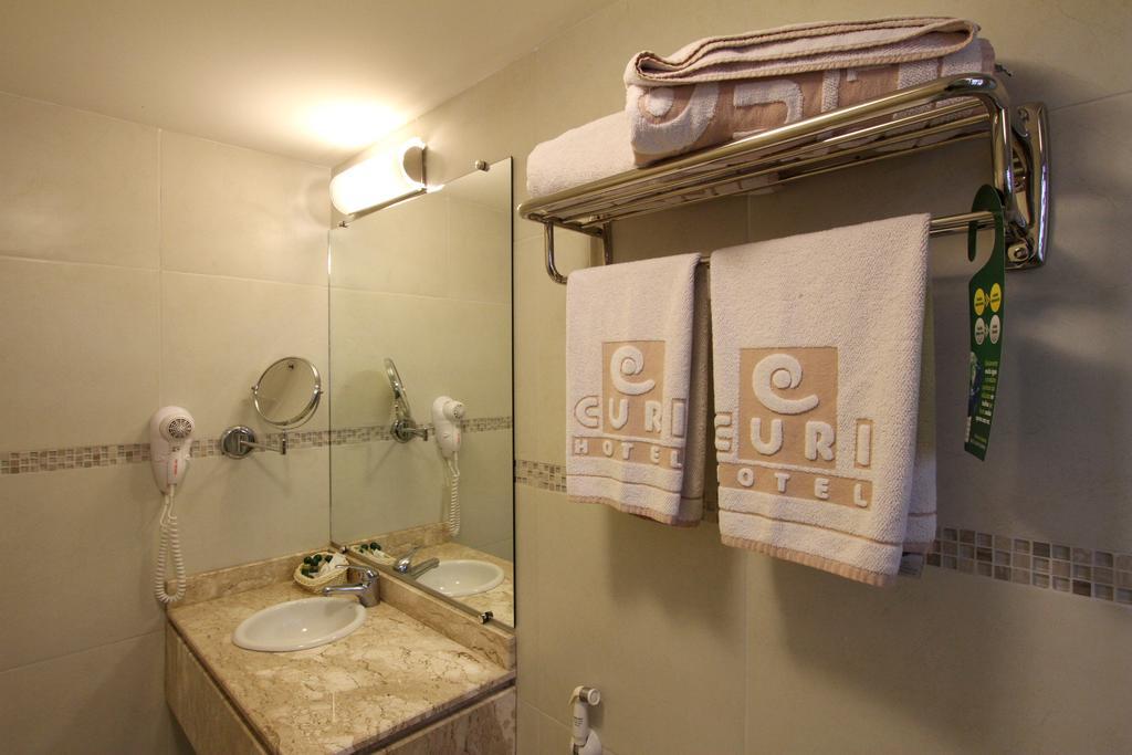 Hotel Curi Executive Pelotas Oda fotoğraf