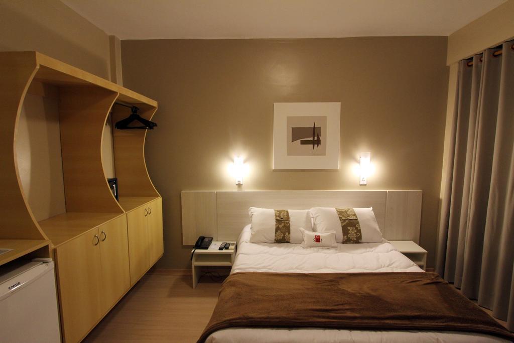 Hotel Curi Executive Pelotas Oda fotoğraf