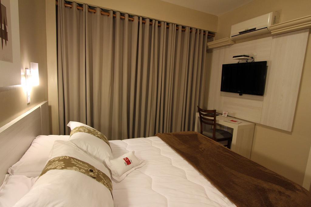 Hotel Curi Executive Pelotas Oda fotoğraf