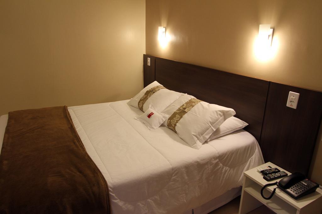Hotel Curi Executive Pelotas Oda fotoğraf