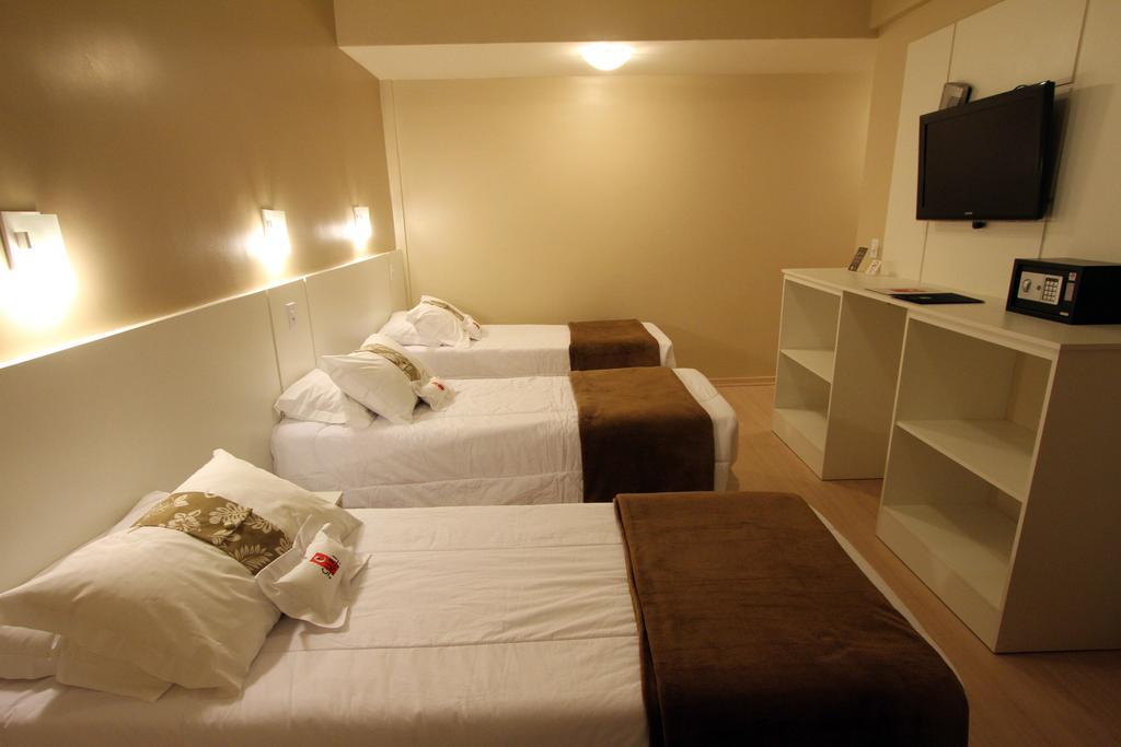 Hotel Curi Executive Pelotas Oda fotoğraf